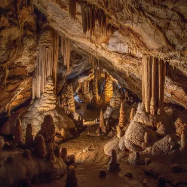 esim Romania visit Cave interior with stalactites and stalagmites