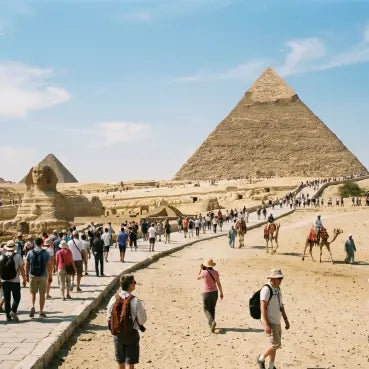 esim data Egypt of Tourists walk toward the Great Pyramid of Giza at the Egyptian Nile Valley, with the Sphinx on the left and a camel on the right under a blue sky.